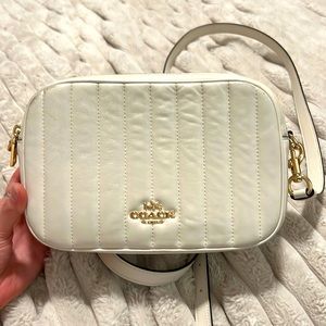 Coach ivory quilted leather cross body purse